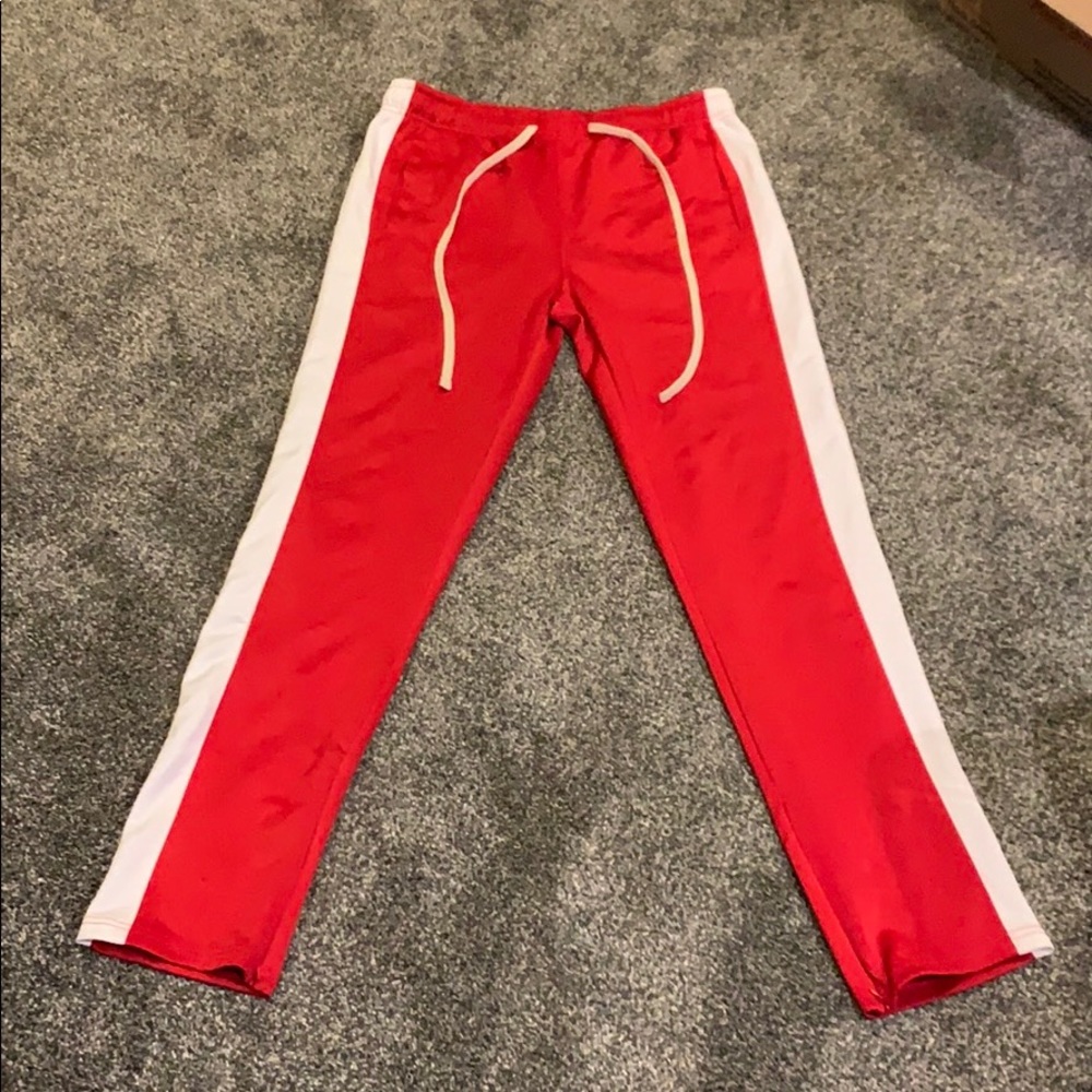 Red men’s track pants XL fits like Large